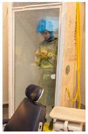 Comparison of an Air-Fed Mask System with Hospital-Issued Personal Protection Equipments for Dental Aerosol Protection During the COVID-19 Pandemic