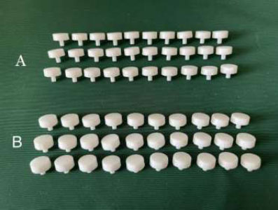 Evaluation of the Effect of Two Surface Treatment Methods on Shear Bond Strength between Porcelain Veneer and Two Different Zirconia Blocks